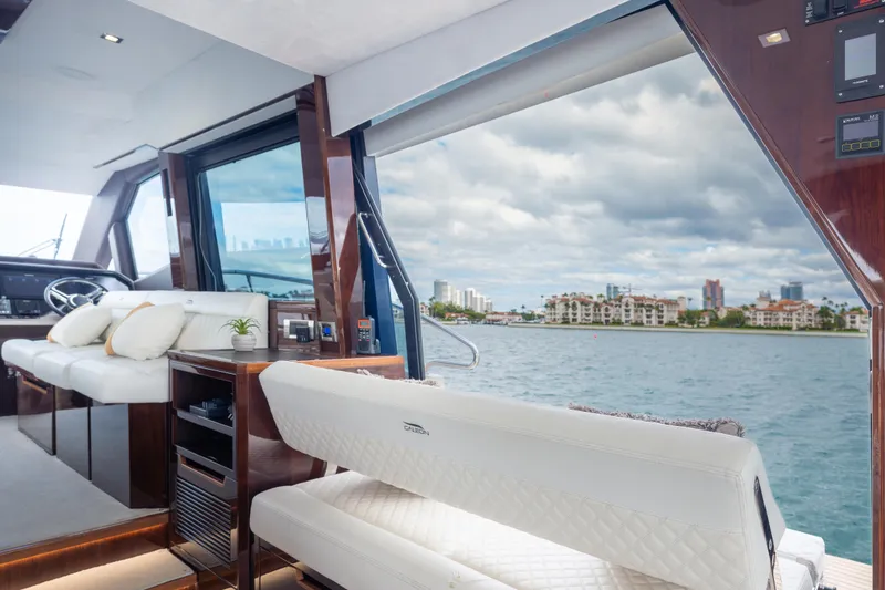Slide: The Image of Luxurious interior of 2020 Galeon 500 Fly yacht with waterfront view. - 35
