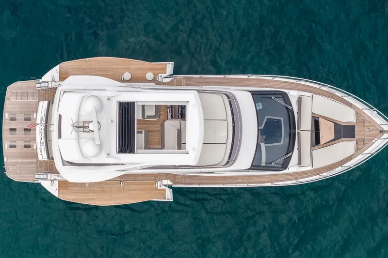 Slide: The Image of Aerial view of 2020 Galeon 500 Fly yacht on blue water. - 4
