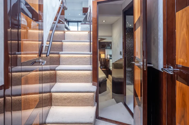 Slide: The Image of Luxurious interior of 2020 Galeon 500 Fly yacht with elegant staircase and modern design. - 44