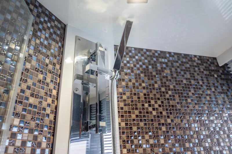 Slide: The Image of Modern shower fixture with mosaic tiles in 2020 Galeon 500 Fly yacht bathroom. - 51
