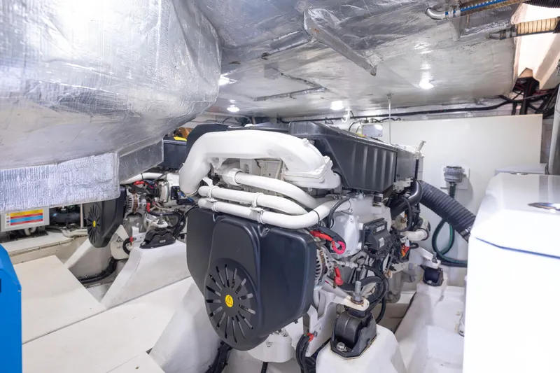 Slide: The Image of Engine room of 2020 Galeon 500 Fly yacht, showcasing modern machinery and components. - 59