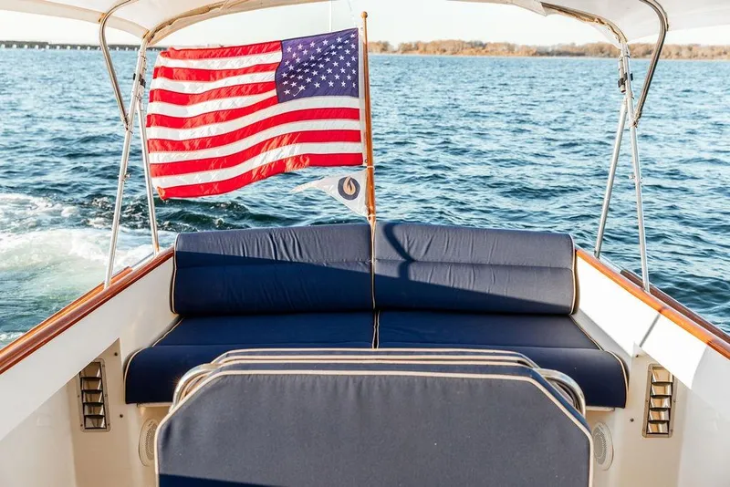 Slide: The Image of Hand operating joystick on 2001 Hinckley Ya Picn boat control panel. - 20