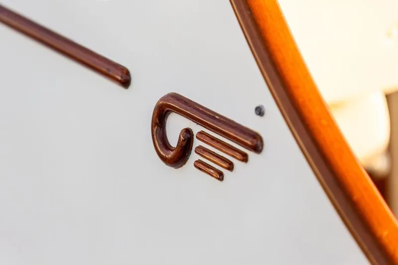 Slide: The Image of 2001 Hinckley Ya Picn boat bathroom with wooden cabinetry and white toilet. - 32