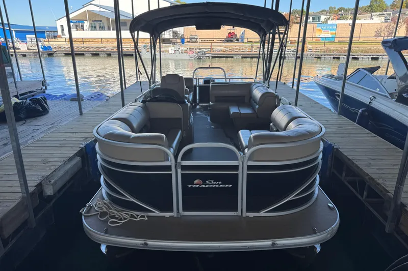 Slide: The Image of 2020 Sun Tracker Party Barge 22 DLX pontoon boat docked at marina. - 3