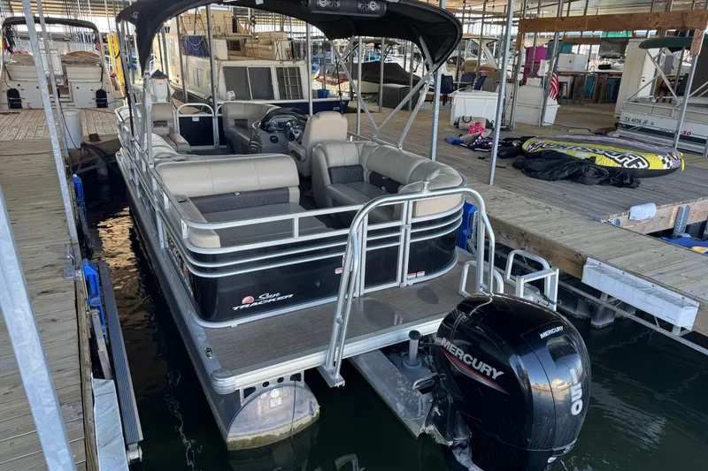 Slide: The Image of 2020 Sun Tracker Party Barge 22 DLX pontoon boat docked at marina. - 6