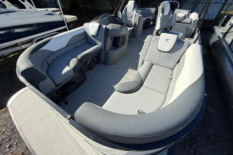 Slide: The Image of 2026 Tahoe Pontoon LTZ Quad Lounger with spacious seating and modern design. - 10