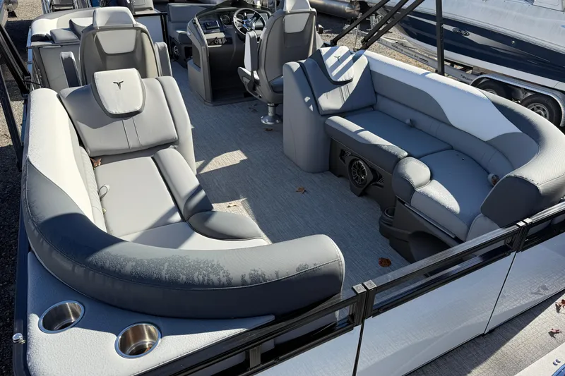 Slide: The Image of 2026 Tahoe Pontoon LTZ Quad Lounger interior with luxurious seating and modern design. - 5