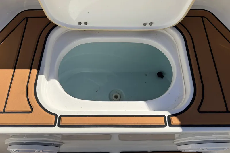 Slide: The Image of Open storage compartment on 2018 Sea Hunt Gamefish 30 Coffin Box boat. - 13