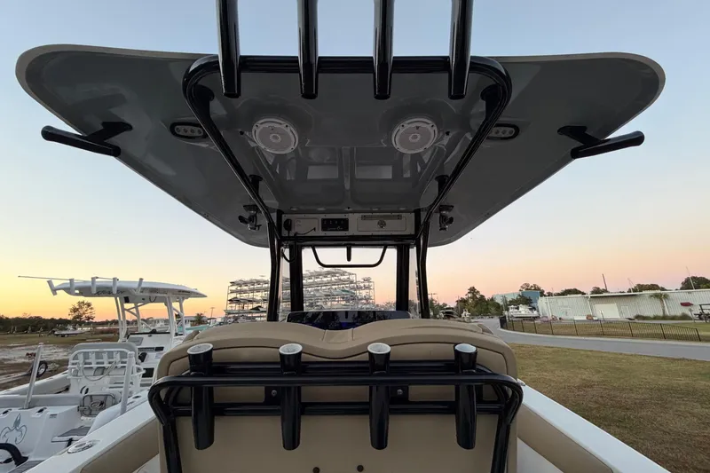 Slide: The Image of 2018 Sea Hunt Gamefish 30 Coffin Box boat, featuring a sleek design at sunset. - 20