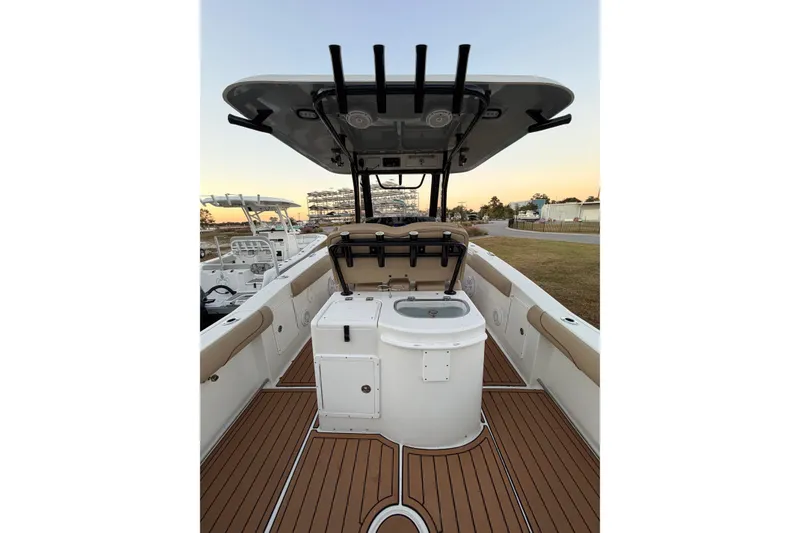 Slide: The Image of 2018 Sea Hunt Gamefish 30 Coffin Box boat interior with seating and storage. - 23