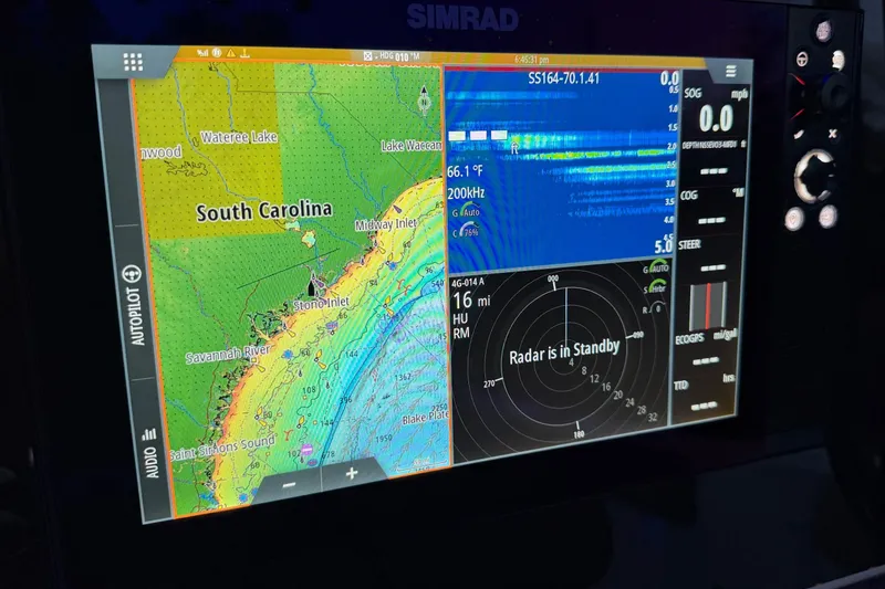 Slide: The Image of Simrad navigation display on 2018 Sea Hunt Gamefish 30, showing South Carolina map and radar. - 37