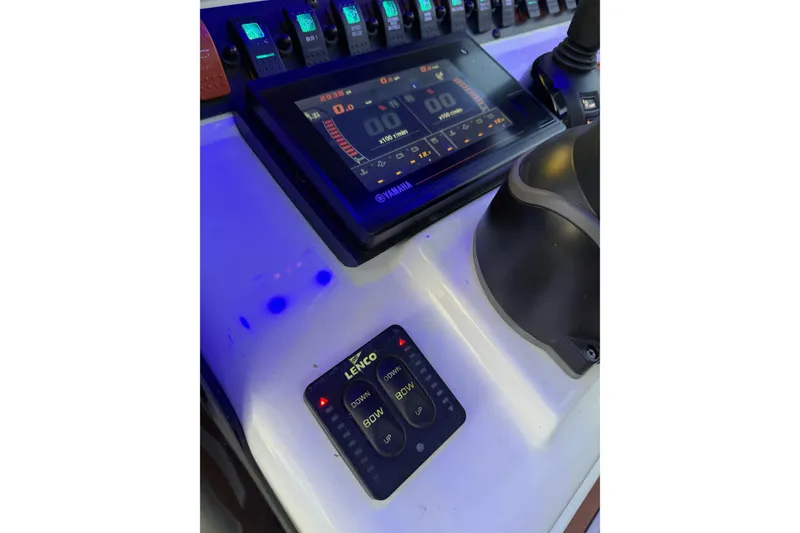 Slide: The Image of Control panel of 2018 Sea Hunt Gamefish 30 Coffin Box with Yamaha display and Lenco controls. - 43