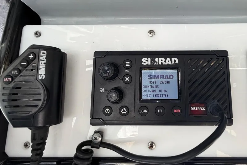Slide: The Image of Simrad RS20 marine radio on 2018 Sea Hunt Gamefish 30 Coffin Box boat dashboard. - 45