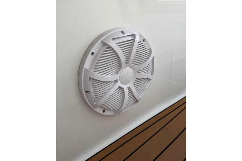 Slide: The Image of White speaker on 2018 Sea Hunt Gamefish 30 Coffin Box boat, mounted on sleek surface. - 48