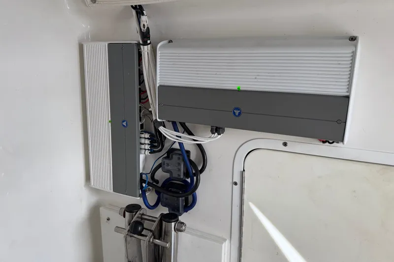 Slide: The Image of 2018 Sea Hunt Gamefish 30 Coffin Box electronics, featuring mounted control units and wiring. - 51