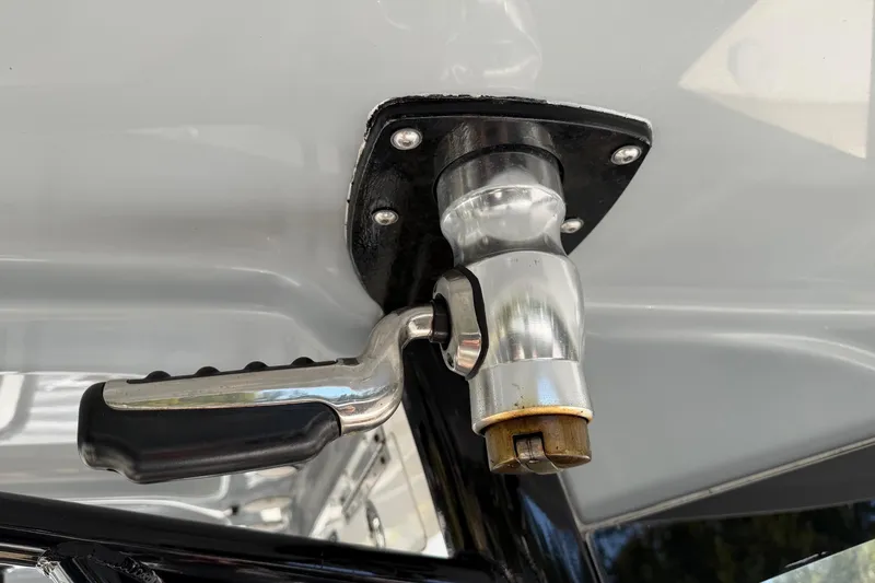 Slide: The Image of Close-up of a 2018 Sea Hunt Gamefish 30 Coffin Box boat handle. - 69