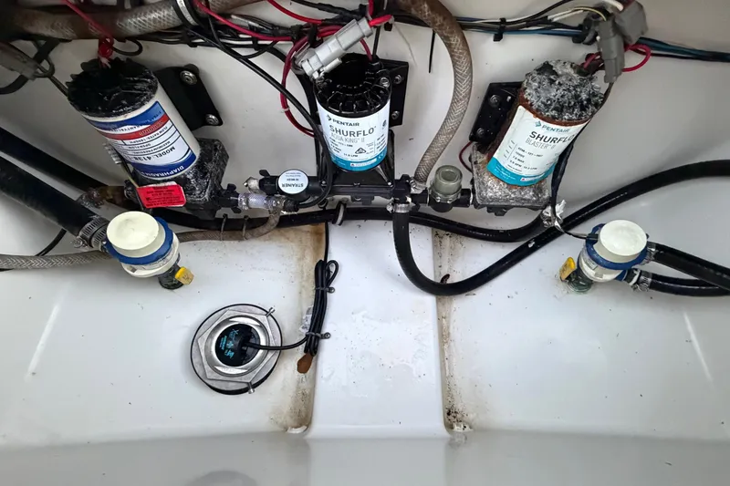 Slide: The Image of 2018 Sea Hunt Gamefish 30 Coffin Box boat wiring and pump system. - 75