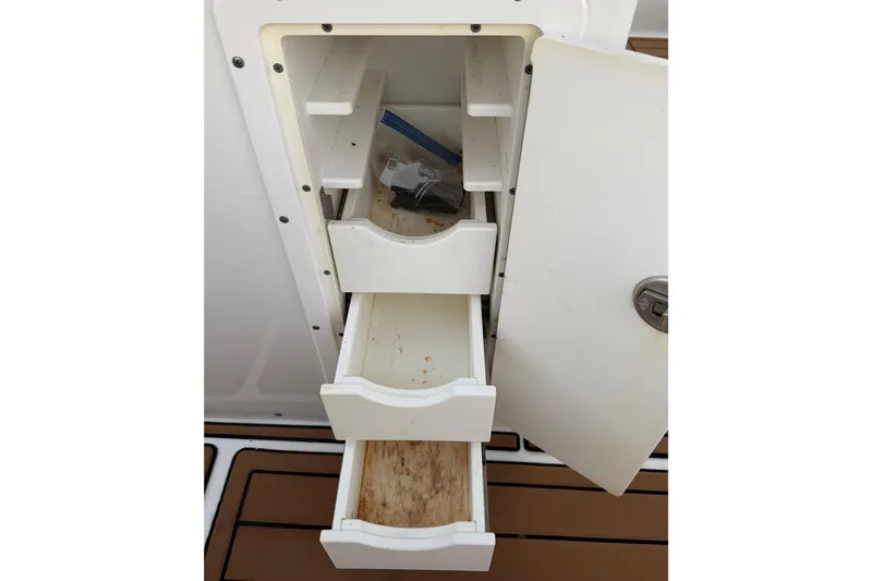 Slide: The Image of Open storage compartment on 2018 Sea Hunt Gamefish 30 Coffin Box boat. - 78