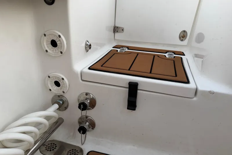 Slide: The Image of 2018 Sea Hunt Gamefish 30 Coffin Box interior with storage and utility features. - 80