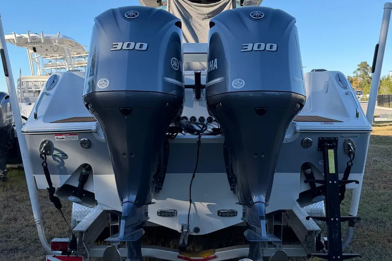 Slide: The Image of 2018 Sea Hunt Gamefish 30 Coffin Box with dual Yamaha 300 engines, rear view. - 82