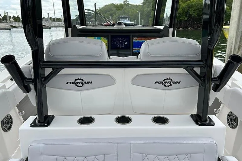 Slide: The Image of 2025 Fountain 38 Center Console boat interior with sleek seating and advanced navigation displays. - 11