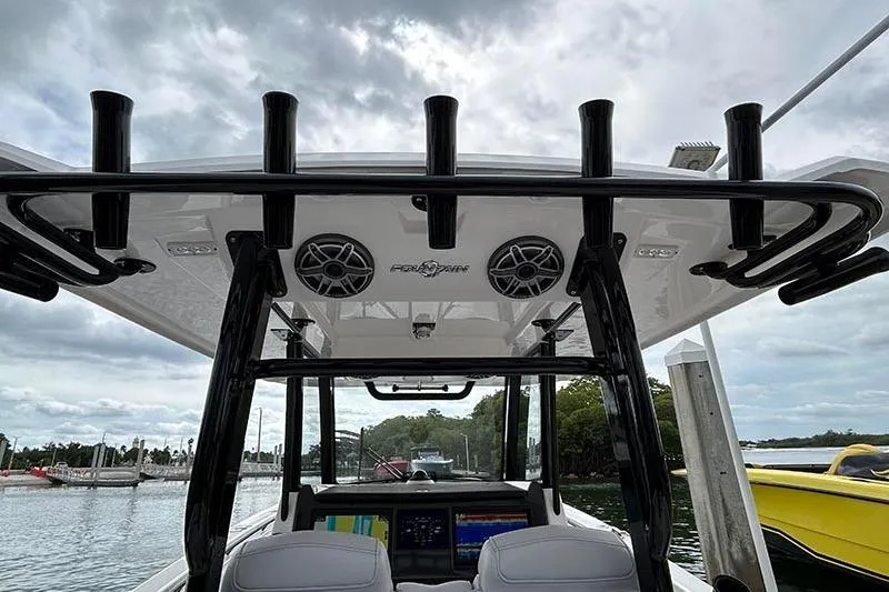Slide: The Image of 2025 Fountain 38 Center Console boat with advanced navigation and speaker system. - 12
