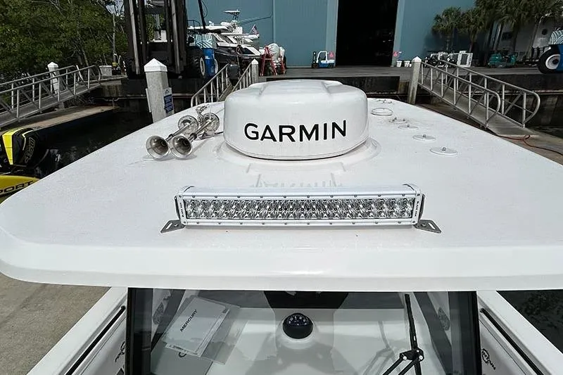 Slide: The Image of 2025 Fountain 38 Center Console boat with Garmin radar and LED light bar. - 6