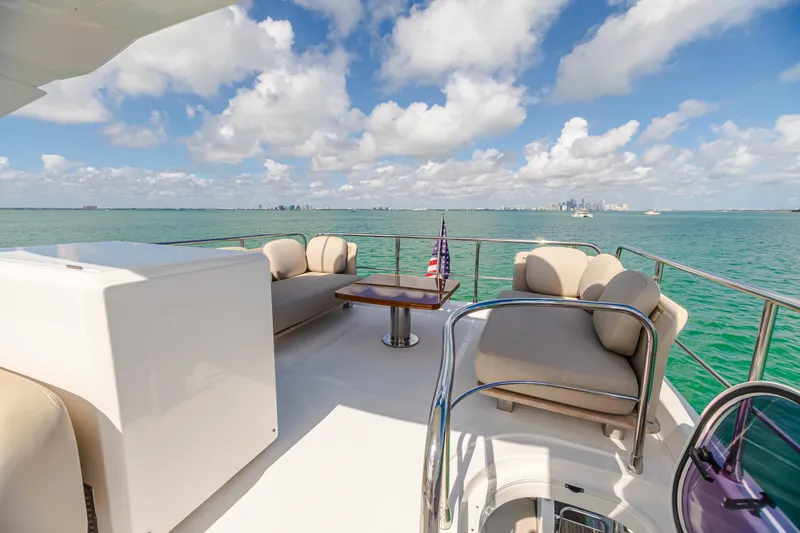 Slide: The Image of Azimut AZ 50-Fly 2020 yacht deck with seating, ocean view, and blue sky. - 11