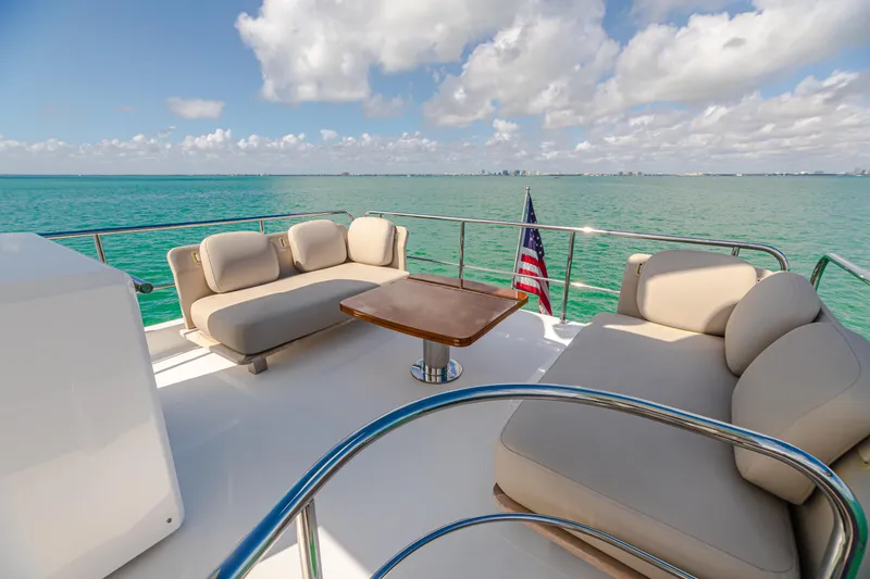 Slide: The Image of Luxurious 2020 Azimut AZ 50-Fly yacht deck with seating, table, and ocean view. - 12