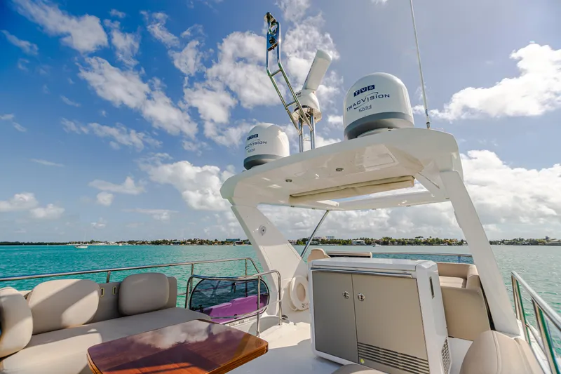 Slide: The Image of 2020 Azimut AZ 50-Fly yacht deck with seating, ocean view, and clear sky. - 14