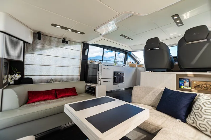 Slide: The Image of Luxurious interior of 2020 Azimut AZ 50-Fly yacht with modern seating and elegant decor. - 23