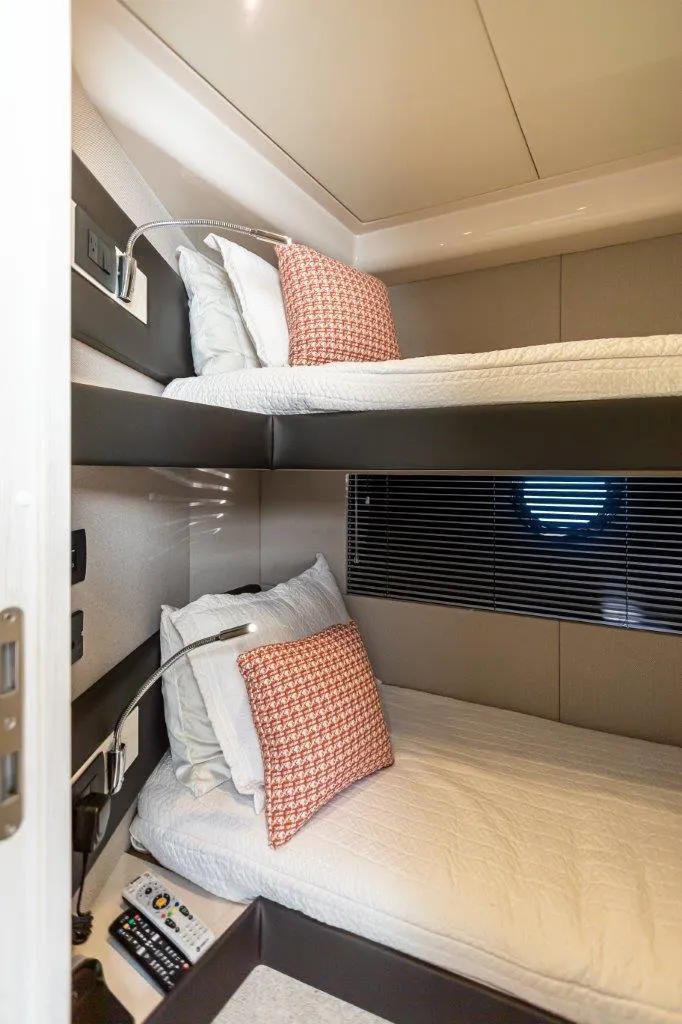 Slide: The Image of 2020 Azimut AZ 50-Fly yacht cabin with bunk beds and modern decor. - 35