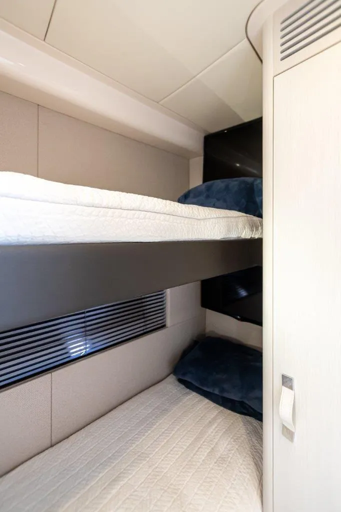 Slide: The Image of 2020 Azimut AZ 50-Fly yacht interior with bunk beds and modern design. - 37