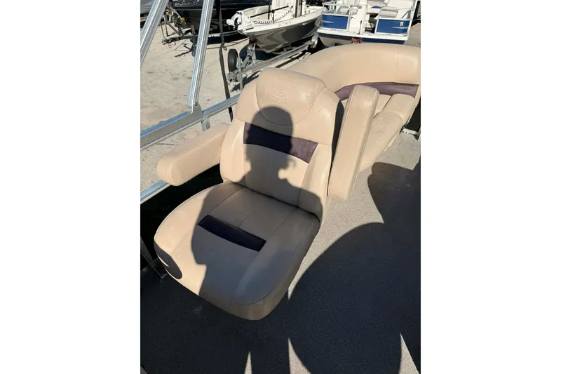 Slide: The Image of 2017 Sun Tracker Party Barge 22 DLX boat seating in sunlight. - 5