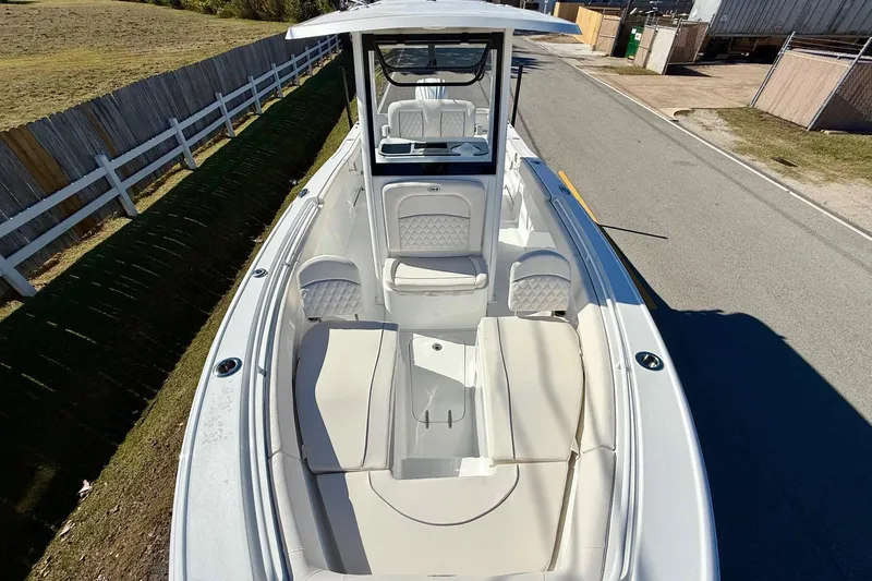 Slide: The Image of 2026 Sea Hunt Ultra 255 SE boat with spacious seating and sleek design. - 16