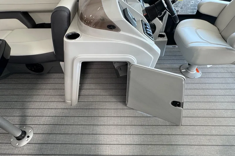 Slide: The Image of Interior of 2026 Starcraft EX 20 Q DH boat with open storage compartment. - 15