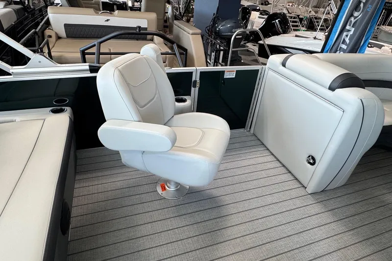 Slide: The Image of 2026 Starcraft EX 20 Q DH boat interior with white seating and modern design. - 16