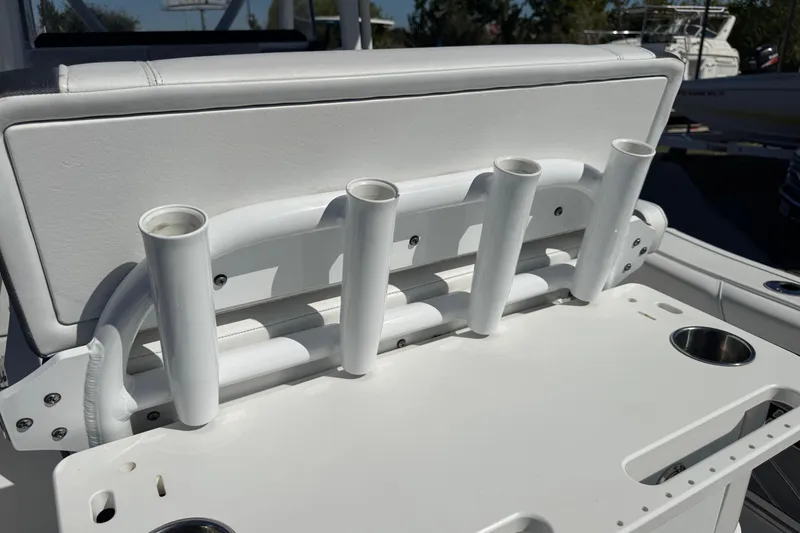 Slide: The Image of 2021 Blackfin 252 CC boat rod holders and seating detail. - 13