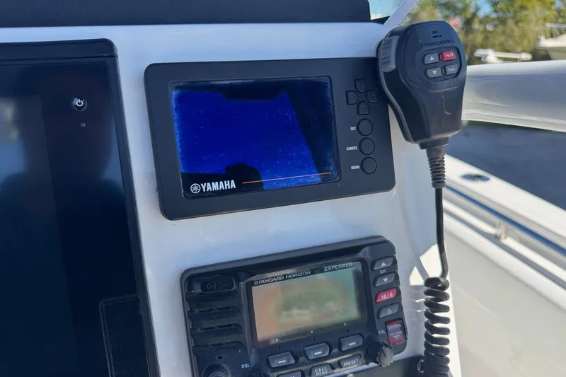 Slide: The Image of Yamaha marine electronics on 2021 Blackfin 252 CC boat dashboard. - 16