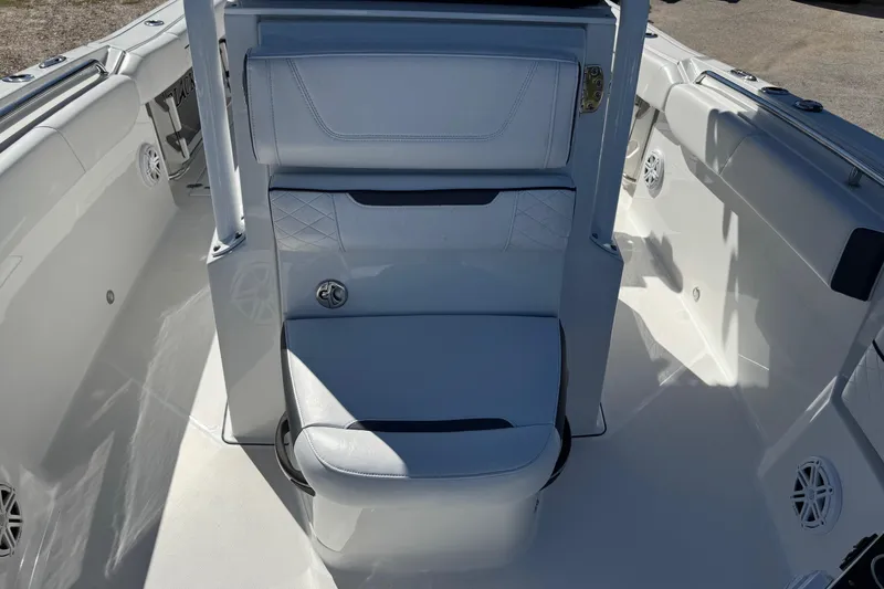 Slide: The Image of 2021 Blackfin 252 CC boat interior with white seating and sleek design. - 25