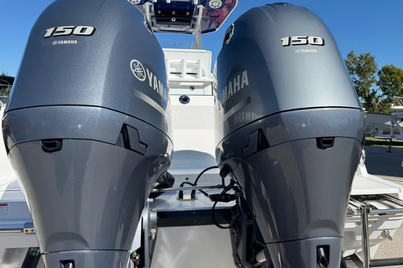 Slide: The Image of Twin Yamaha 150 engines on a 2021 Blackfin 252 CC boat. - 43
