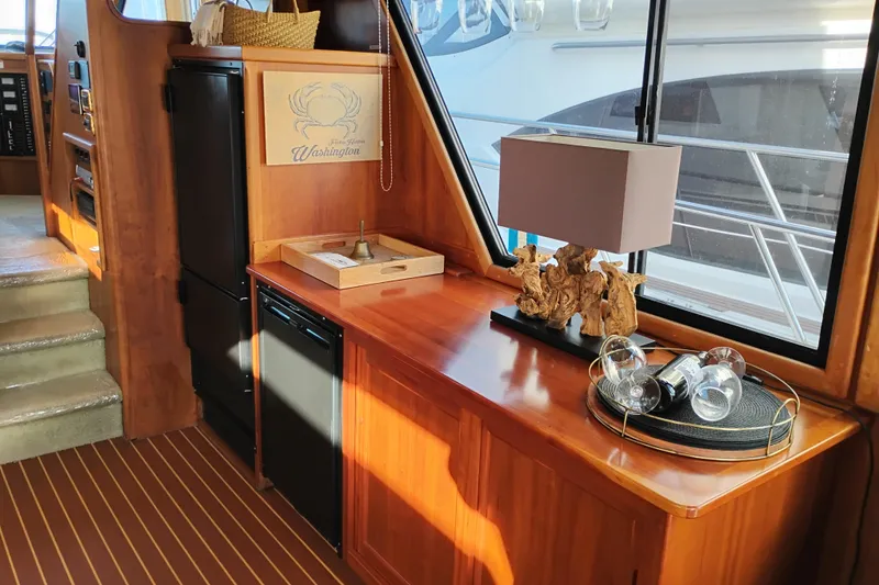 Slide: The Image of Interior of 2002 Canoe Cove 50 Pilothouse Motor Yacht with elegant wood finish. - 28