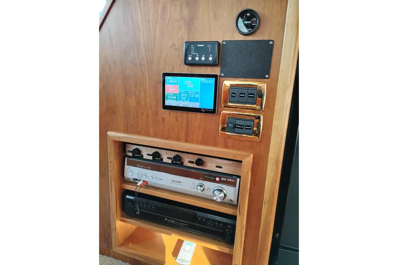 Slide: The Image of Control panel of 2002 Canoe Cove 50 Pilothouse Motor Yacht with electronic displays and switches. - 30