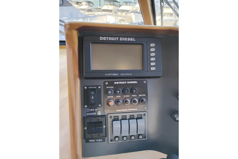 Slide: The Image of Control panel of a 2002 Canoe Cove 50 Pilothouse Motor Yacht with Detroit Diesel display. - 36