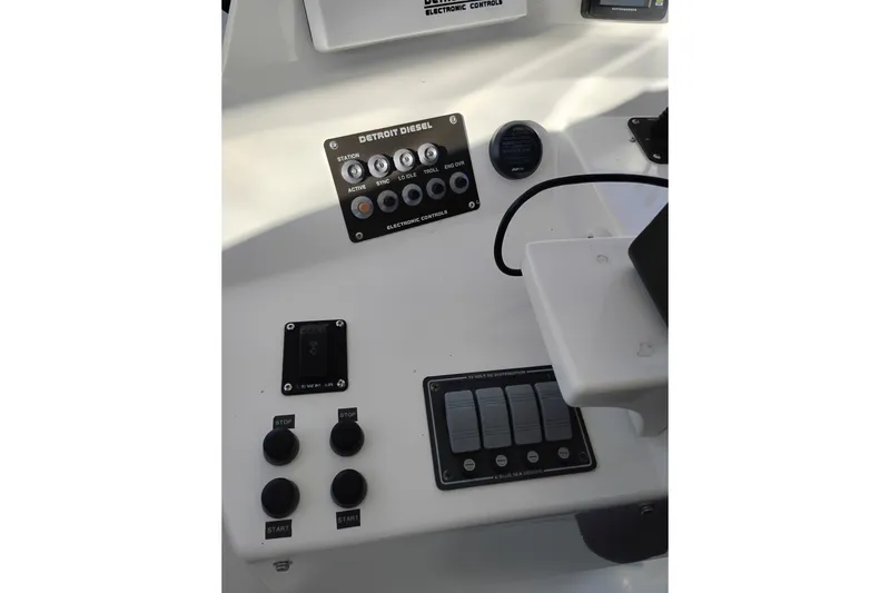 Slide: The Image of Control panel of 2002 Canoe Cove 50 Pilothouse Motor Yacht with Detroit Diesel electronic controls. - 53