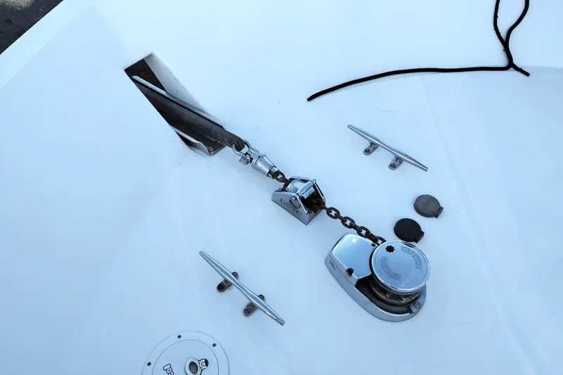 Slide: The Image of Anchor and chain mechanism on 2002 Canoe Cove 50 Pilothouse Motor Yacht deck. - 83
