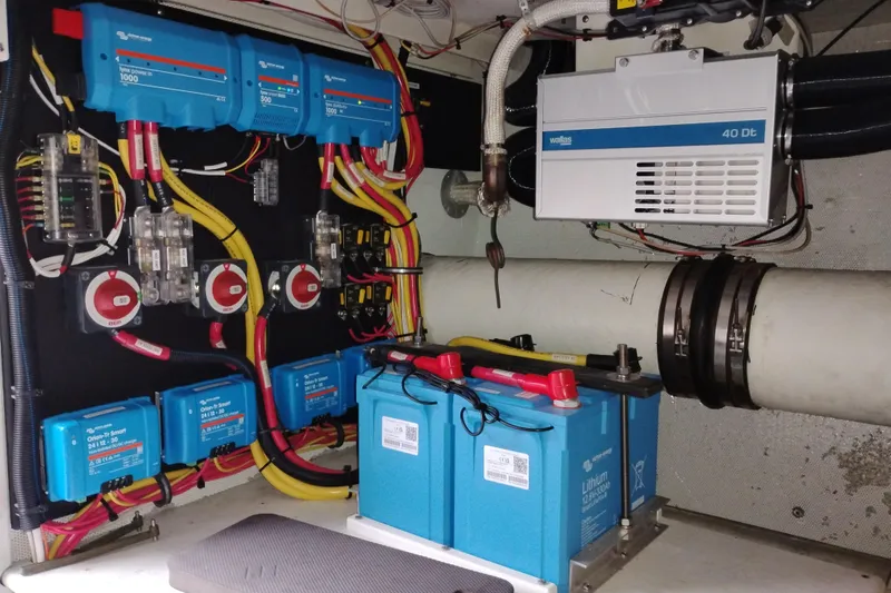 Slide: The Image of Electrical system of a 2002 Canoe Cove 50 Pilothouse Motor Yacht with batteries and wiring. - 88