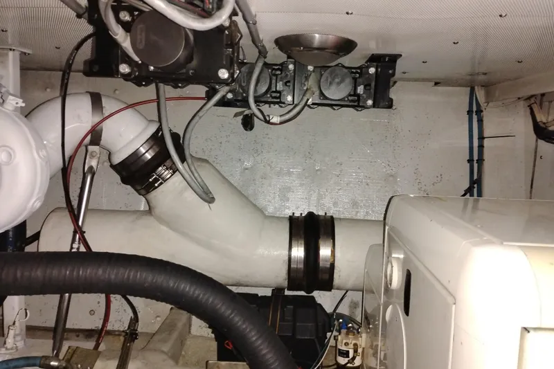 Slide: The Image of Engine room of 2002 Canoe Cove 50 Pilothouse Motor Yacht, showcasing mechanical components. - 91