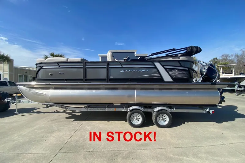 The Image of 2024 Starcraft SLS 3 pontoon boat on trailer, available in stock. - 1