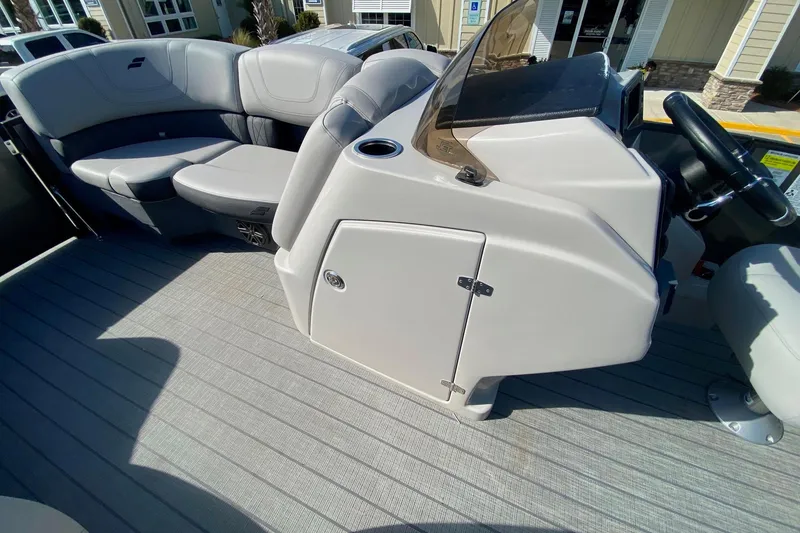 Slide: The Image of 2024 Starcraft SLS 3 boat interior with seating and helm station. - 17